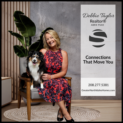 Debbie Taylor, North Idaho REALTOR®, sitting with her Miniature Aussiedoodle. Represents Taylor Connections Real Estate with the tagline “Connections That Move You.”