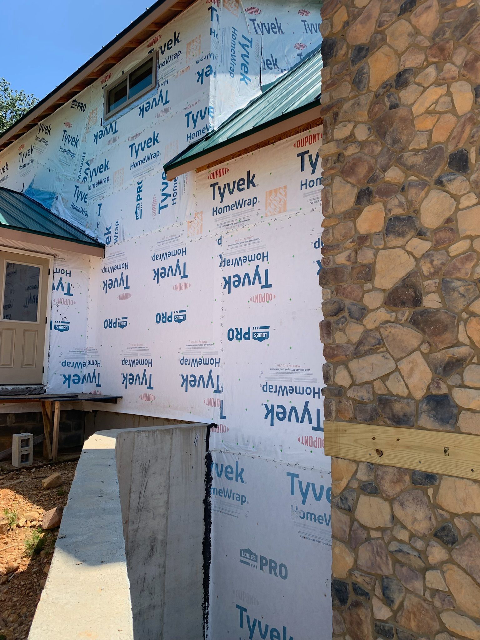 A house with styrofoam on the side of it