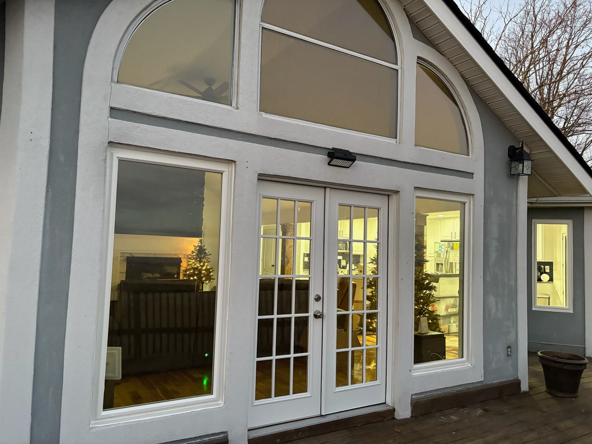 A house with a lot of windows and doors
