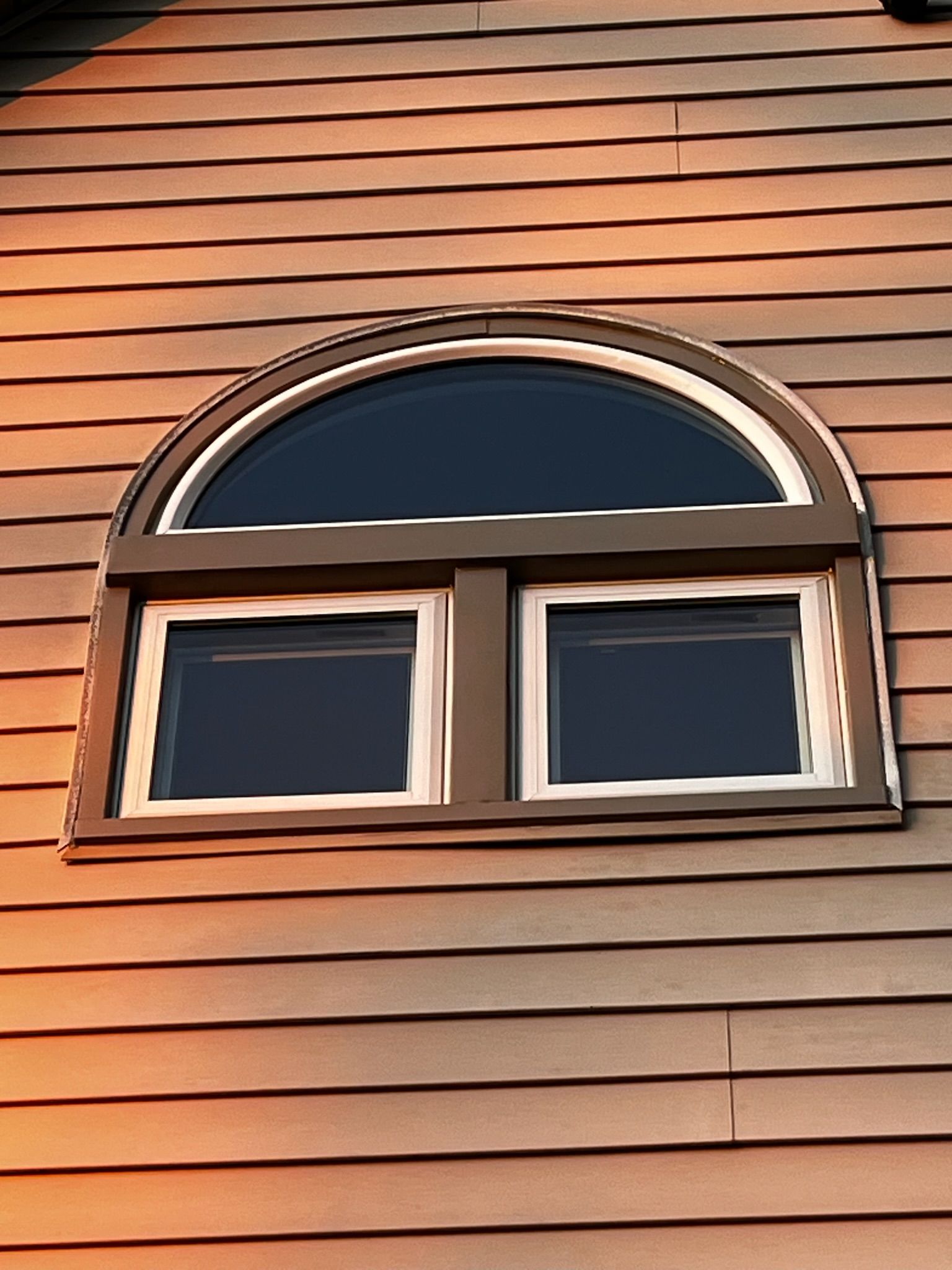 A house with a window on the side of it