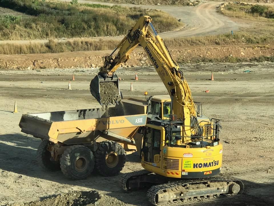 A Bunch of Blocks Are Sitting on The Ground in A Field — Adam Lowe Earthmoving Pty Ltd in Somersby, NSW
