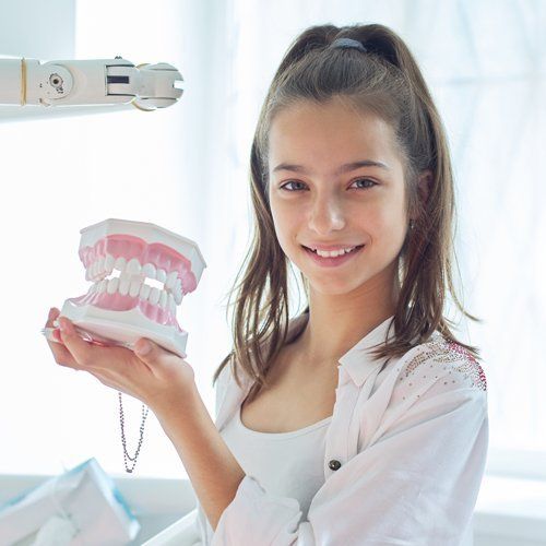 Smiling Girl — Pensacola, FL — Dr. Phillip Drlicka, D.D.S.