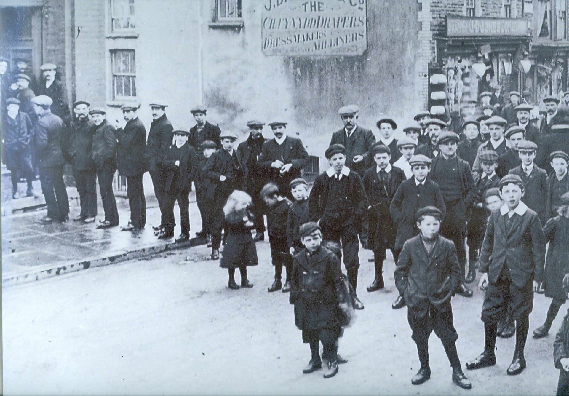 Striking miners attend a meeting at the Workmens' Hall, Howell Street c.1910 during the Cambrian Combine Dispute