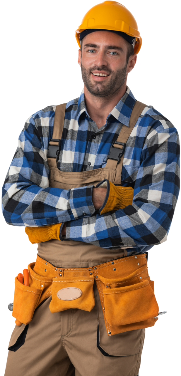 Construction worker smiling, arms crossed, wearing a yellow hard hat, plaid shirt, tool belt, and work gloves.