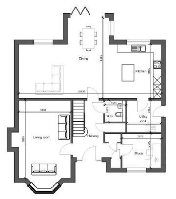 A black and white floor plan of a house with a living room , dining room , and kitchen.