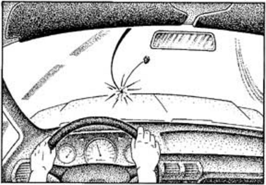 A black and white drawing of a person driving a car with a broken windshield.