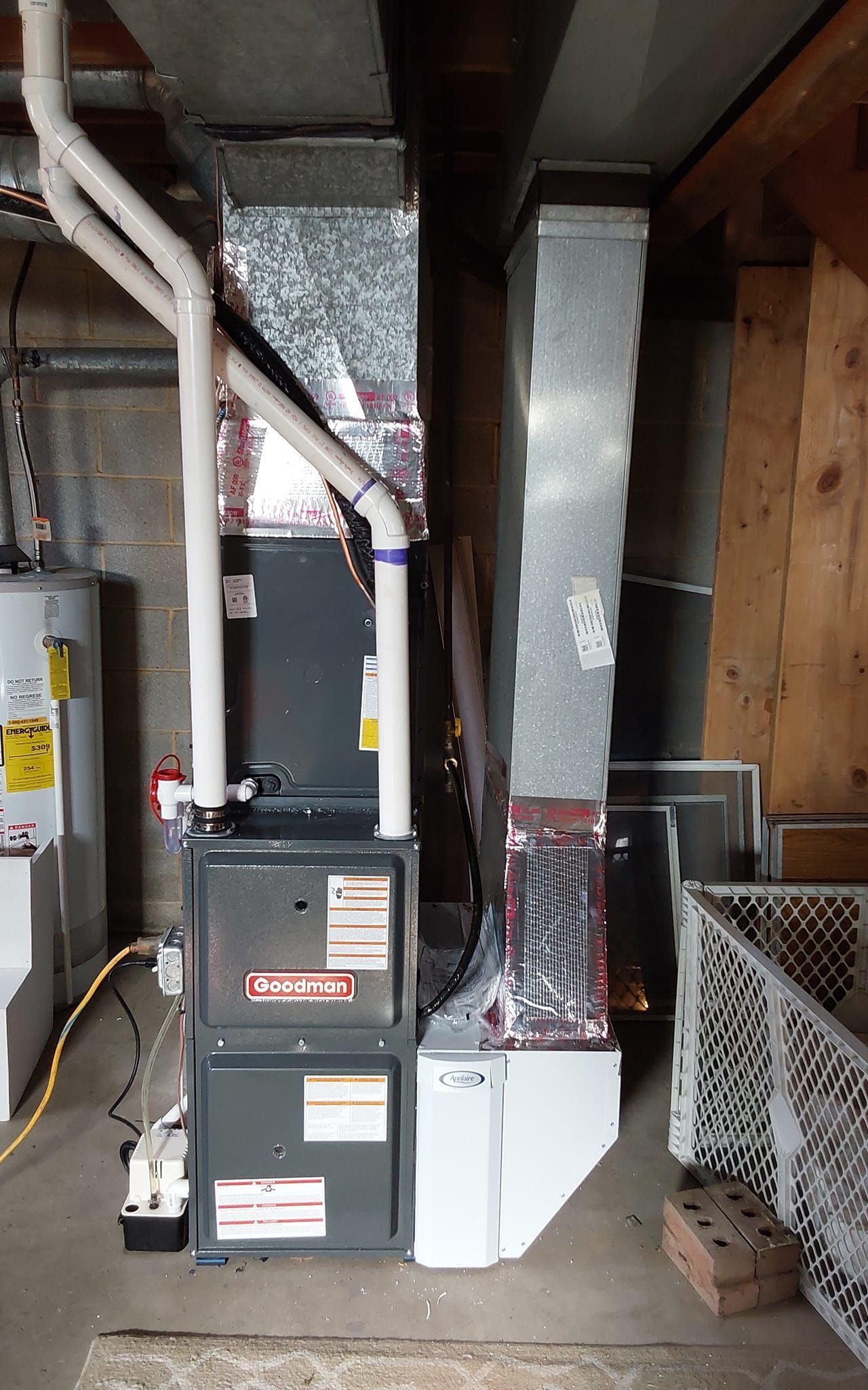 A room with a furnace and a water heater