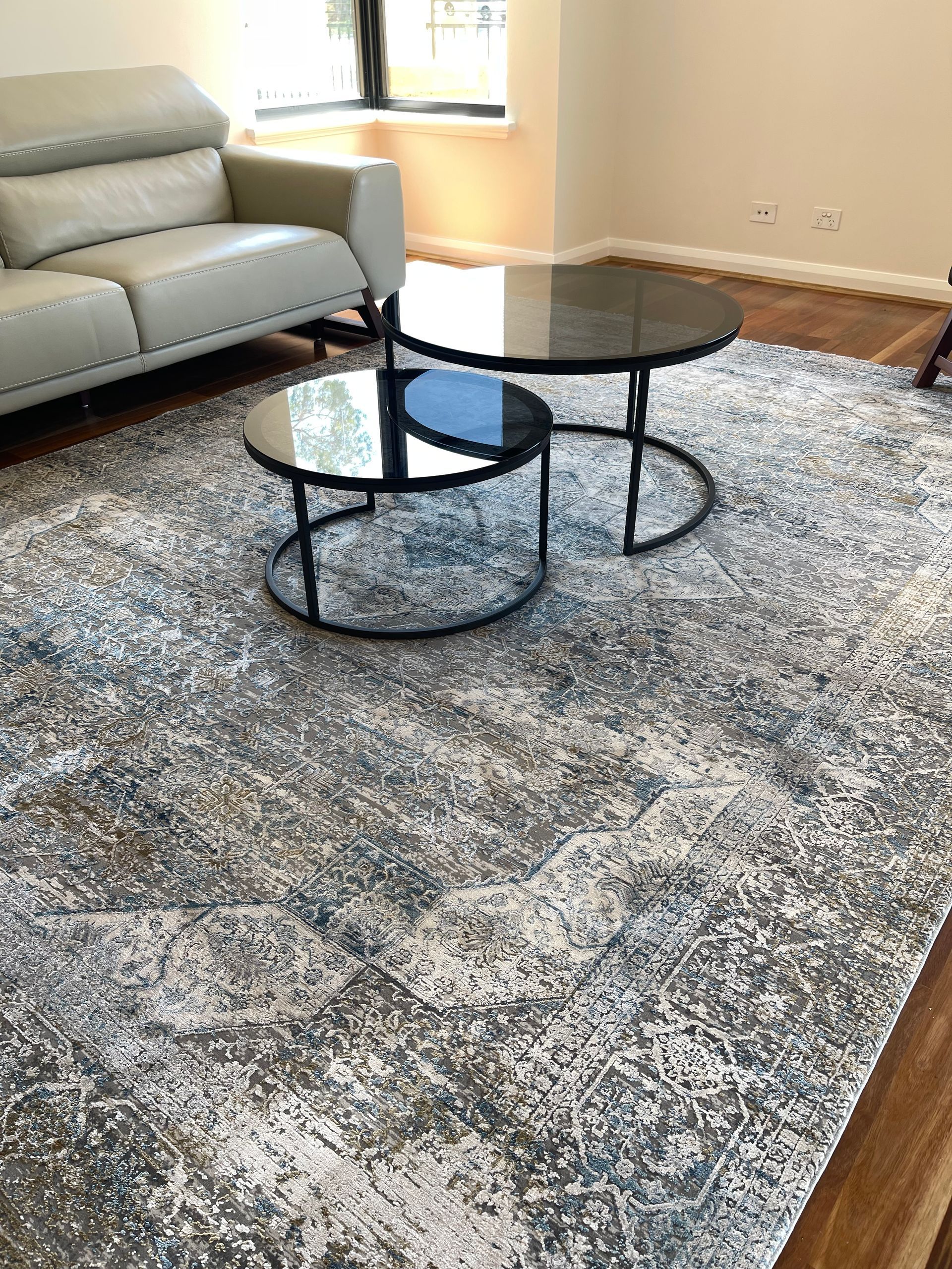 man installing tile flooring