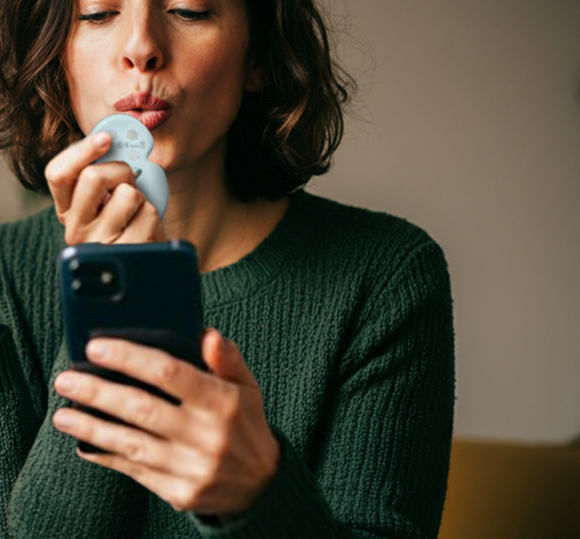 Women using the egg biosensor and Seesaw Health breathwork app
