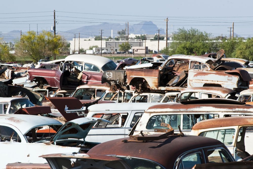 A Lot of Old Cars Are Sitting in a Junkyard — Murwillumbah Motor Wreckers In Gold Coast, QLD