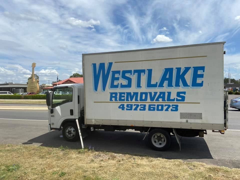 White Westlake Removals Truck Parked on The Side of A Road — Westlake Removals in Bonnells Bay, NSW