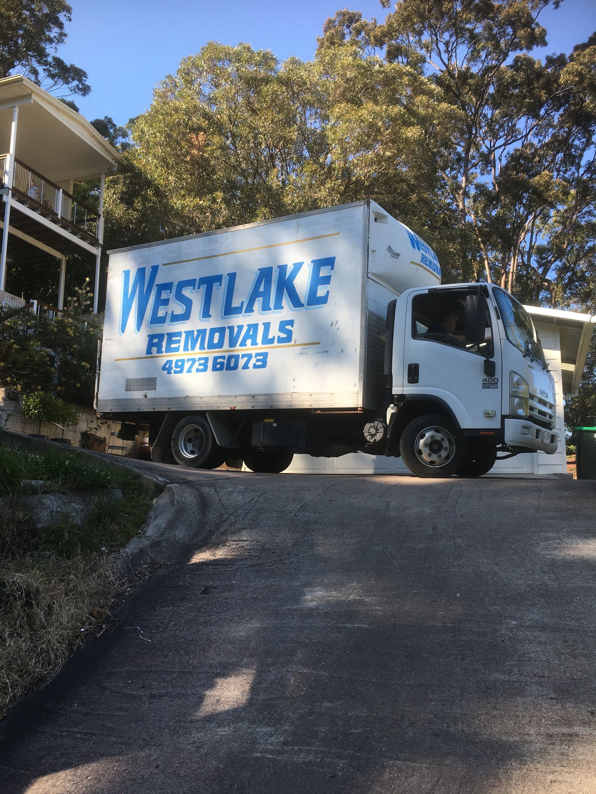 Westlake Removals truck parked outside a home in Wyong