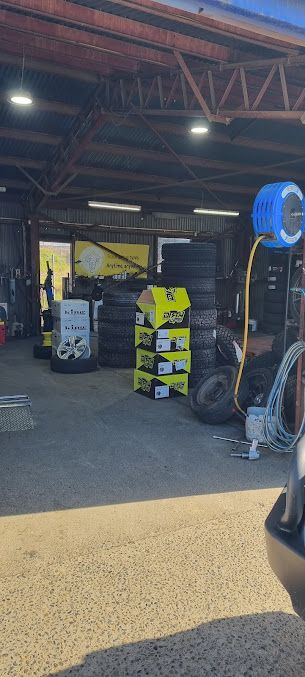 A Garage Filled With Lots Of Tires And Boxes Of Tires — Clarence Valley Tyre Centre in South Grafton, NSW