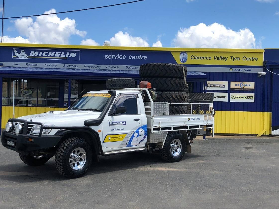 A White Truck Is Parked In Front Of A Michelin Service Centre — Clarence Valley Tyre Centre in South Grafton, NSW