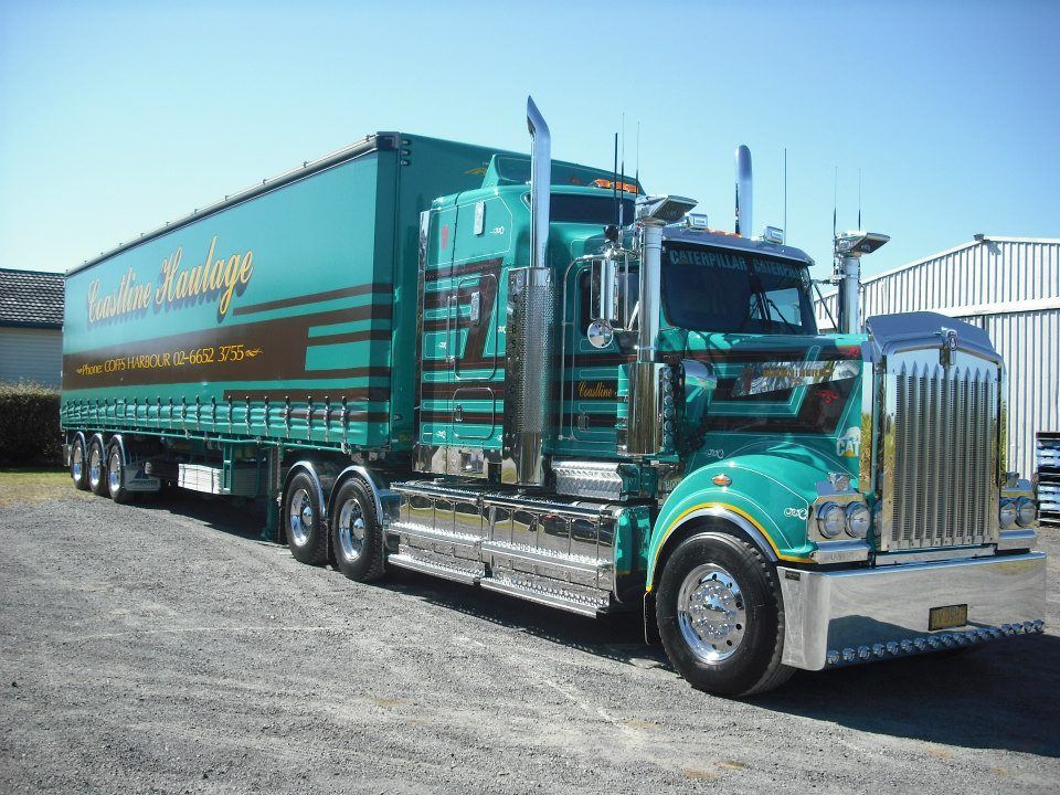 A Large Red Truck Parked Up On Gravel Road — Clarence Valley Tyre Centre in South Grafton, NSW
