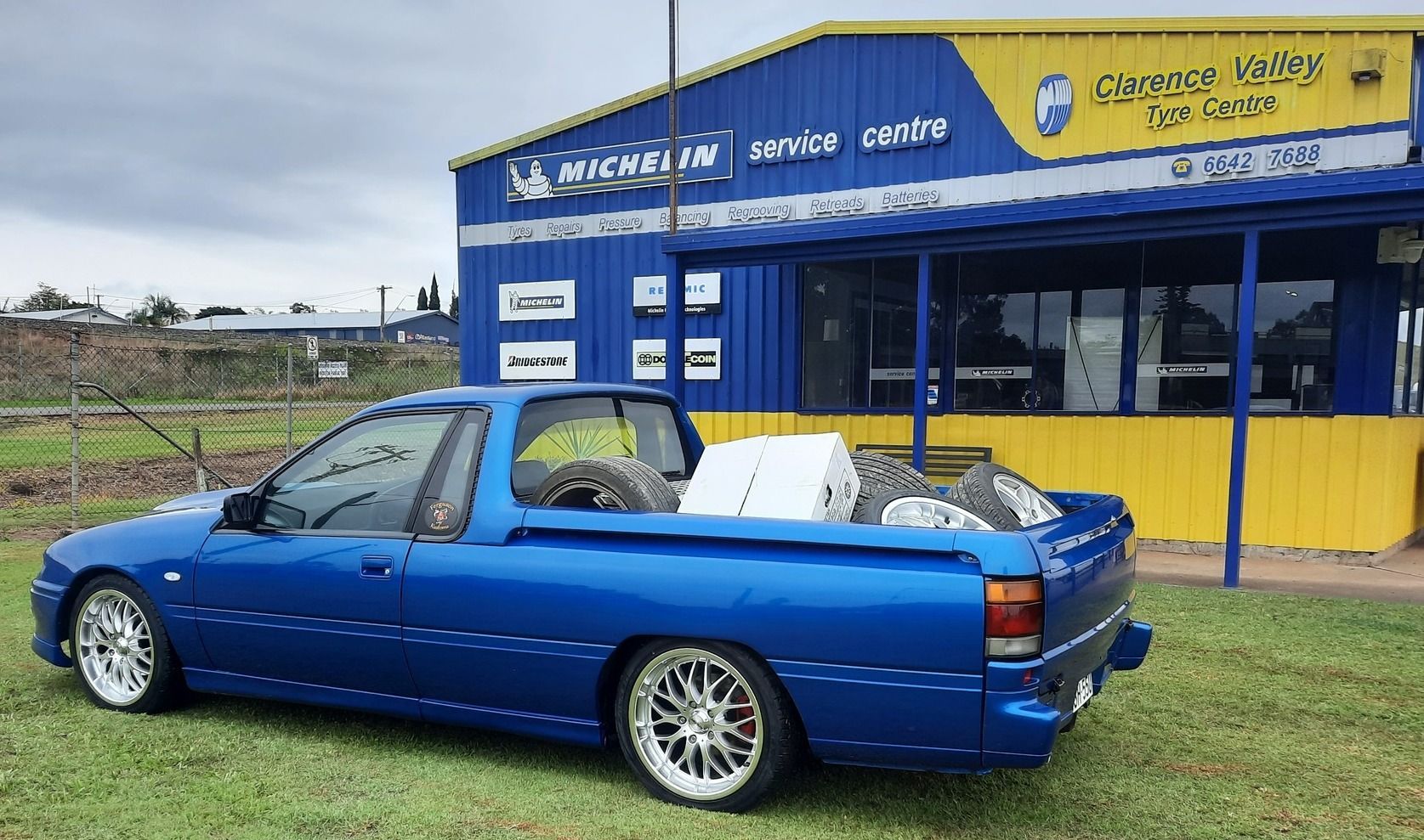 A Blue Truck Is Parked In Front Of A Building — Clarence Valley Tyre Centre in South Grafton, NSW