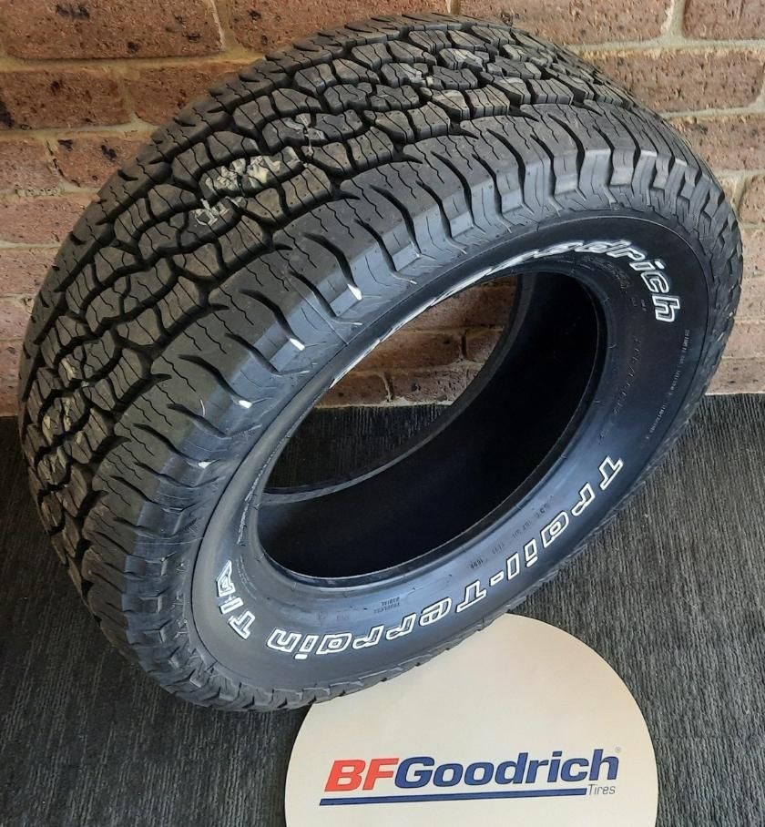 A Bfgoodrich Tire Is Sitting On A Brick Wall — Clarence Valley Tyre Centre in South Grafton, NSW
