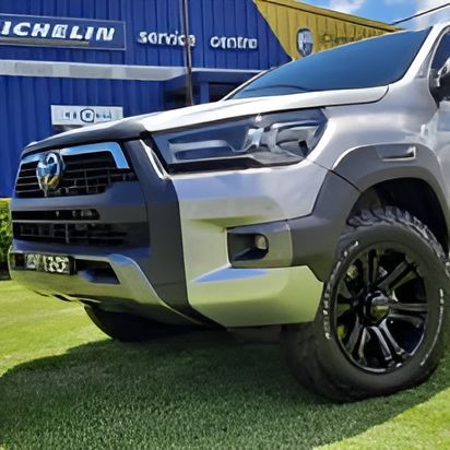 A White Truck Is Parked In Front Of A Michelin Service Centre — Clarence Valley Tyre Centre in South Grafton, NSW