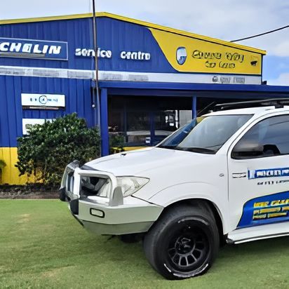 A White Truck Is Parked In Front Of A Michelin Service Centre — Clarence Valley Tyre Centre in South Grafton, NSW