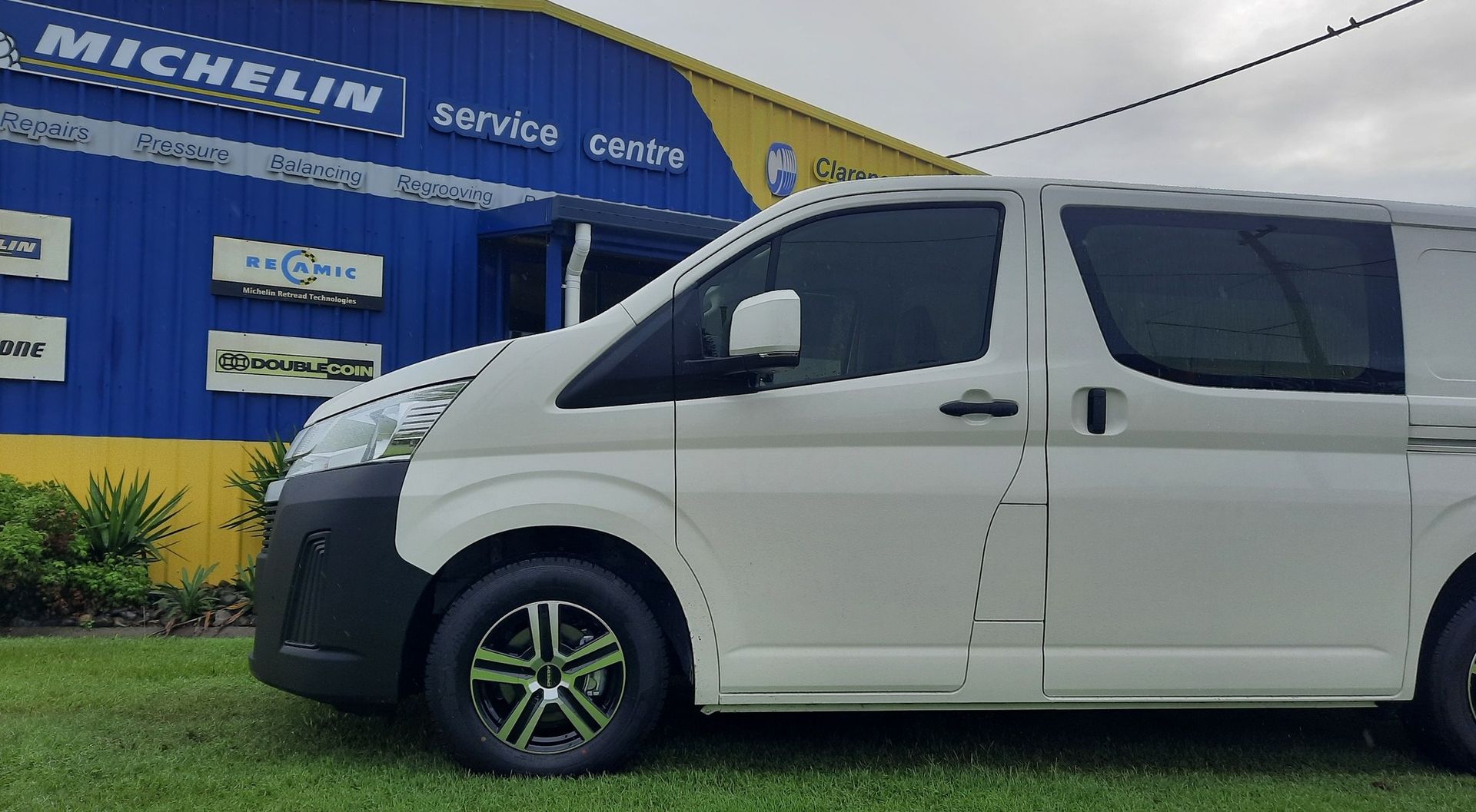Close Up Of A White Van Parked Outside A Shop— Clarence Valley Tyre Centre in South Grafton, NSW