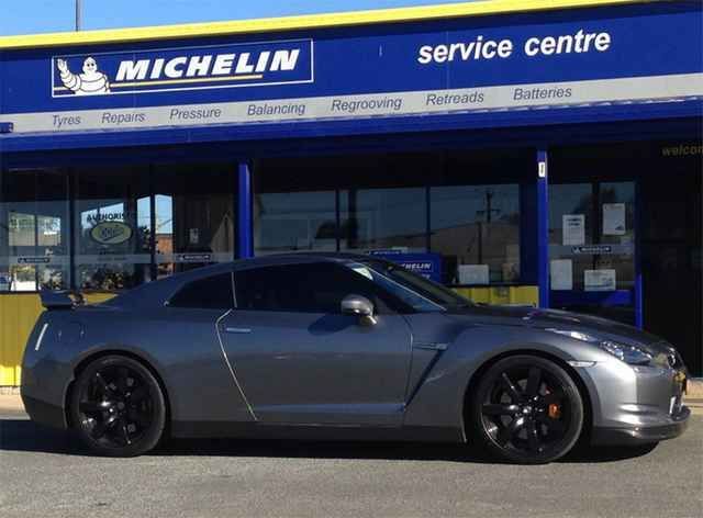 A Gray Car Is Parked In Front Of A Michelin Service Centre — Clarence Valley Tyre Centre in South Grafton, NSW