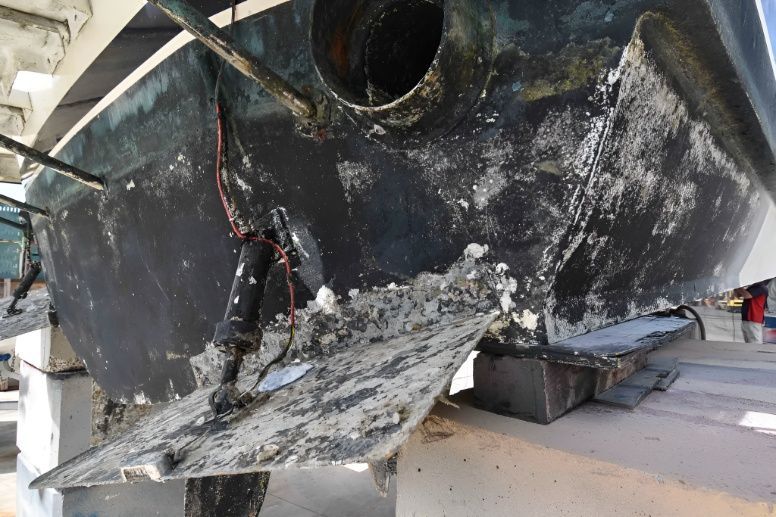 The Bottom of a Boat is Covered in a Lot of Dirty Stains — Sandy Straits Marine In Urangan, QLD
