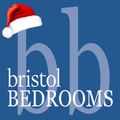 The logo for bristol bedrooms has a santa hat on it