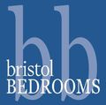 The logo for bristol bedrooms has a santa hat on it