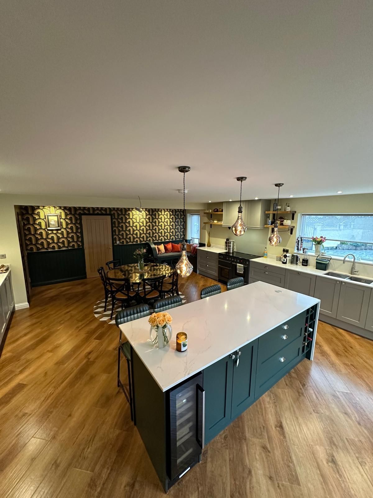 A library with lots of books and a chair