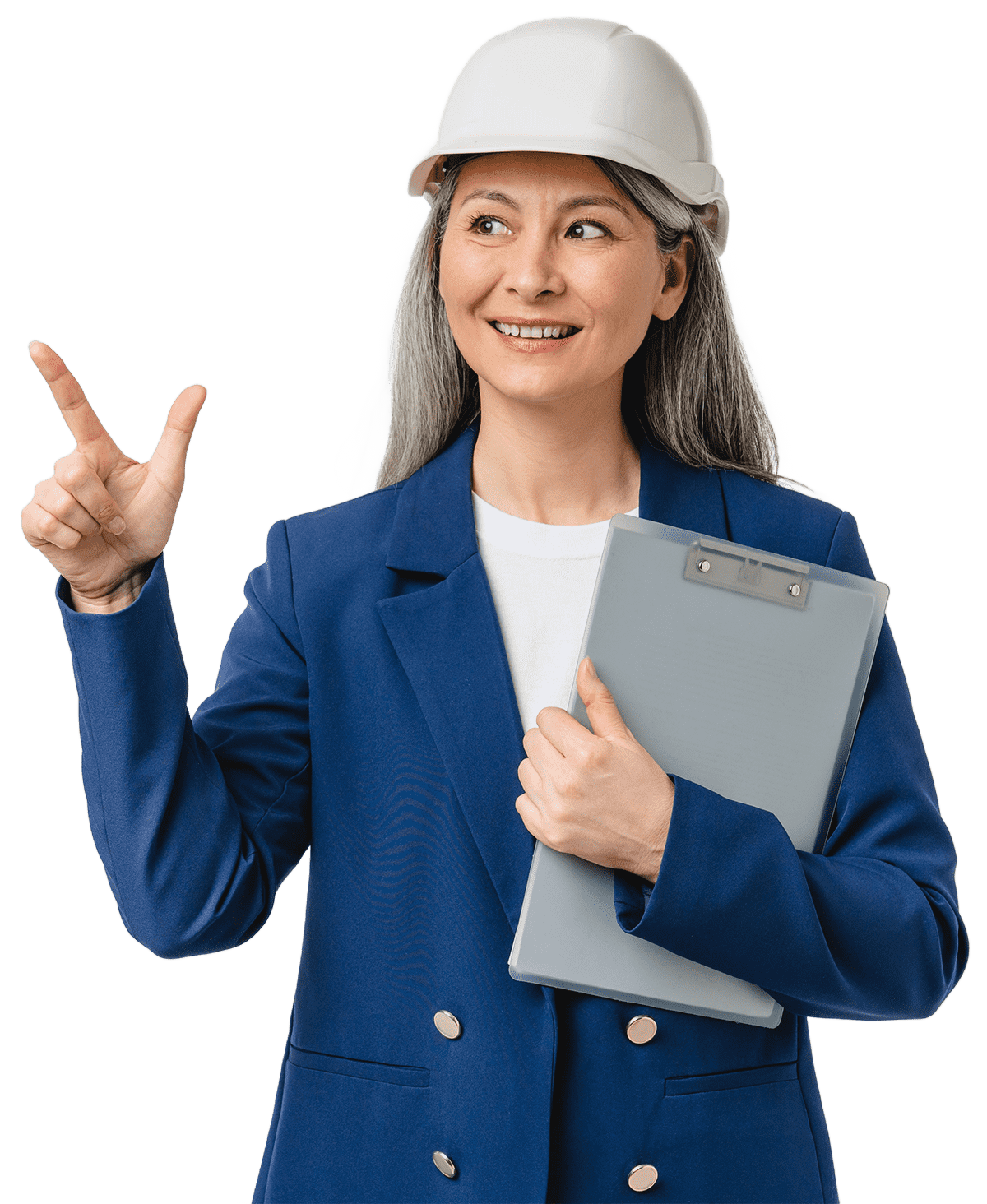 a woman wearing a hard hat is holding a clipboard and pointing up .