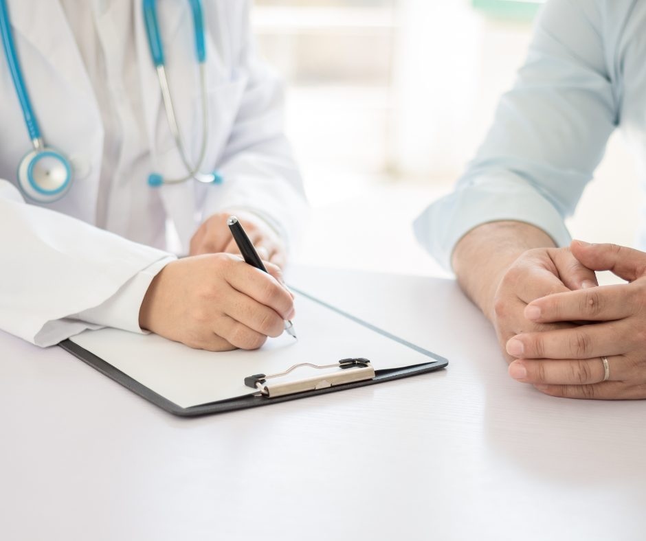 picture of primary care provider talking to patient, taking notes