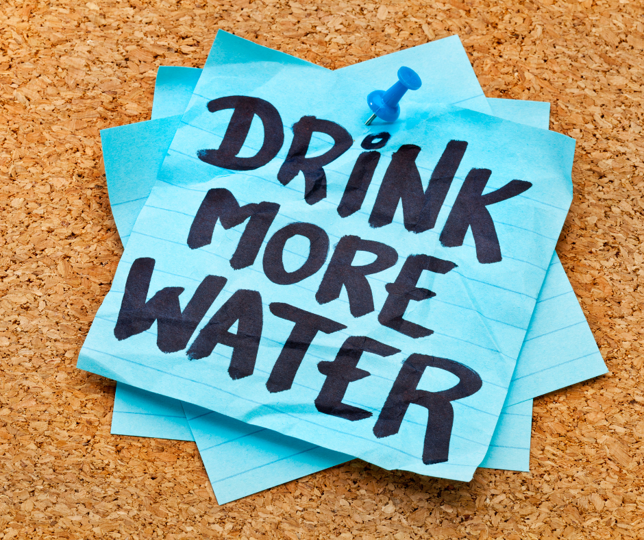 graphic of cork board with a reminder to drink more water