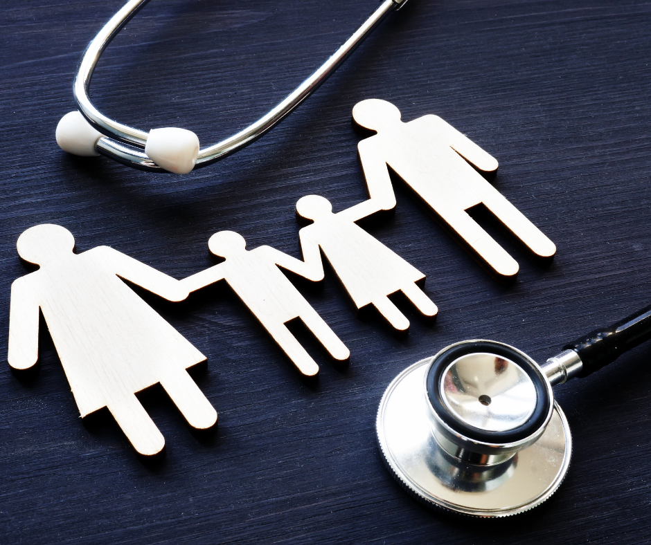 graphic of wooden family figures with a stethoscope on a dark surface