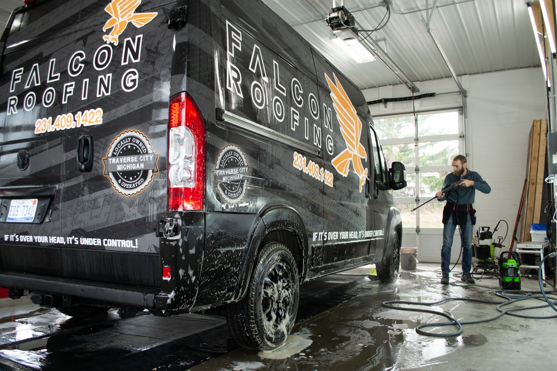 A service van is power washed in our Acme Auto Spa shop.