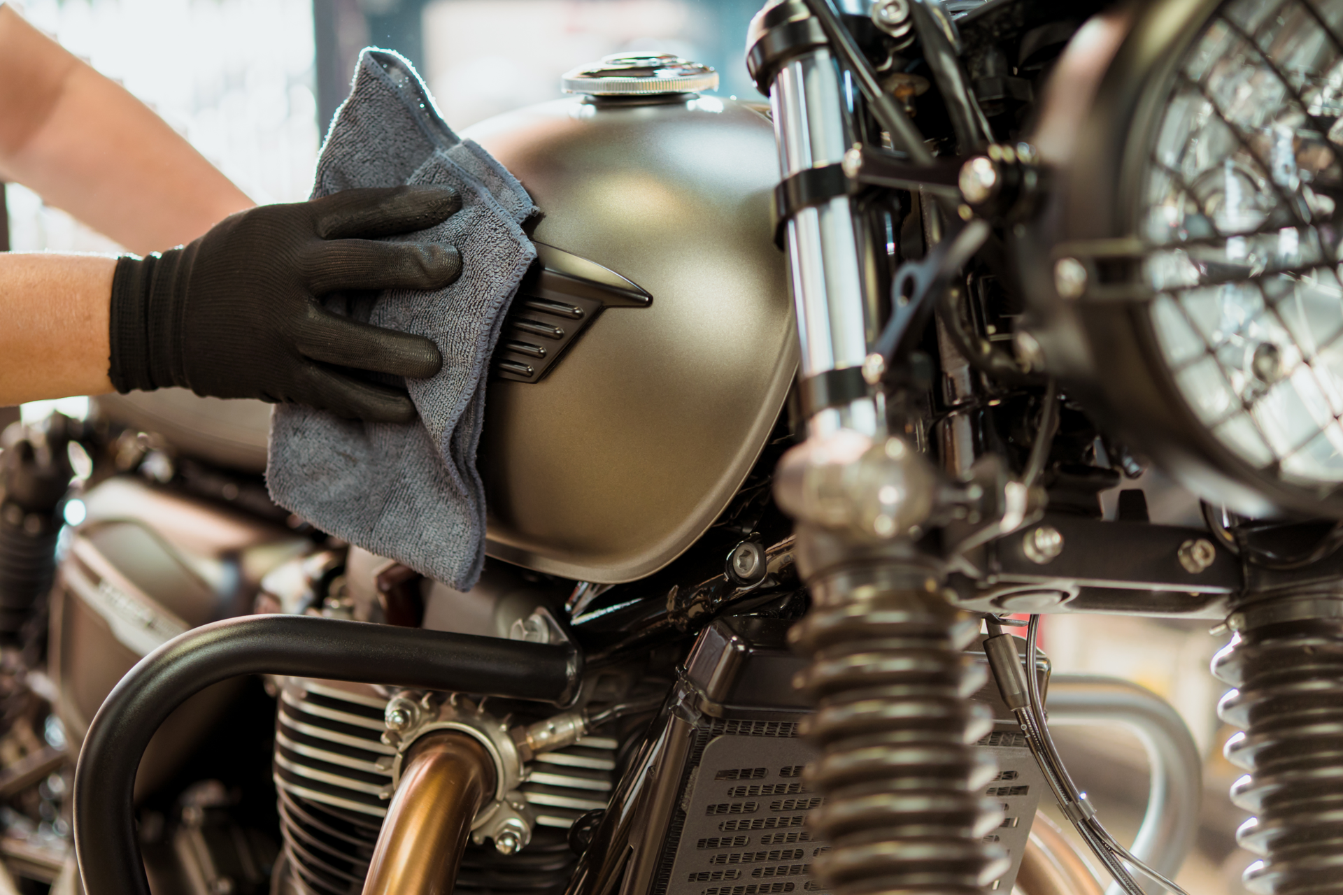 Motorcycle being polished and cleaned