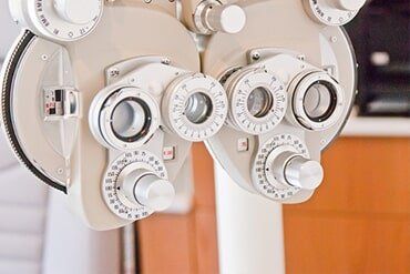 Routine Eye Exam — Woman Choosing Eyeglasses in Stockton, CA Routine Eye Exam — Woman Choosing Eyeglasses in Stockton, CA