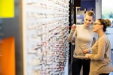 Designer Eyewear — Staff Introducing Eyeglasses in Stockton, CA