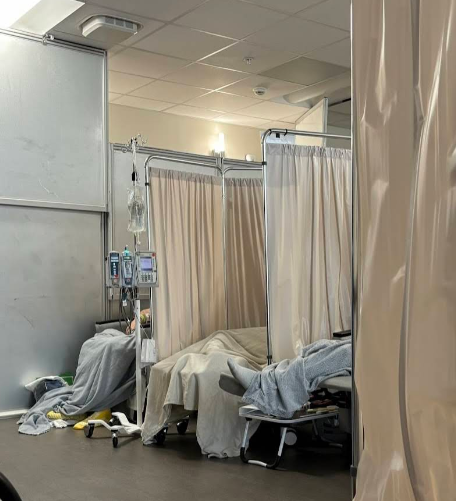 Sunrise Hospital. Patient-124 was placed in a room with 20 other patients, 6 inches apart and only one bathroom.