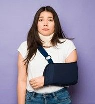 Sunrise Hospital. Stock photo of a woman with her arm in a sling.