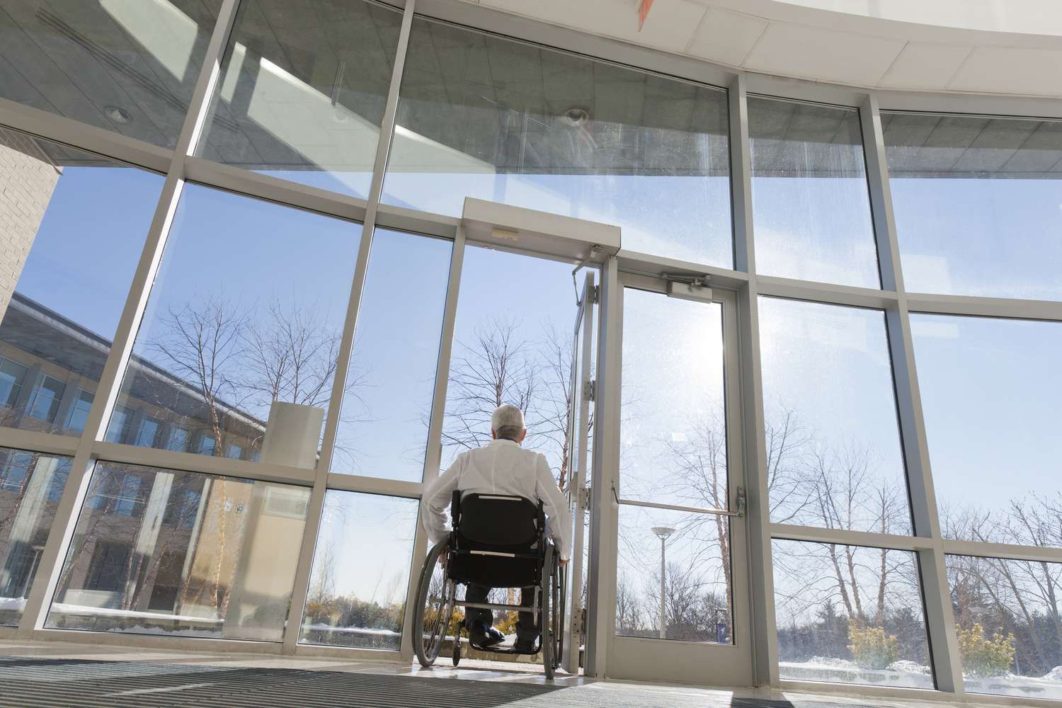 Sunrise Hospital. Stock photo of a man leaving the hospital.