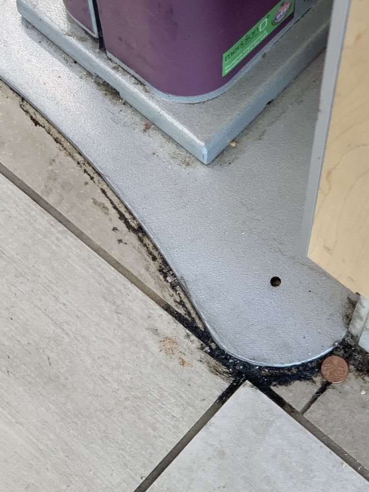 Sunrise Hospital _dirt and black substance on the floor and equipment in the Emergency Room