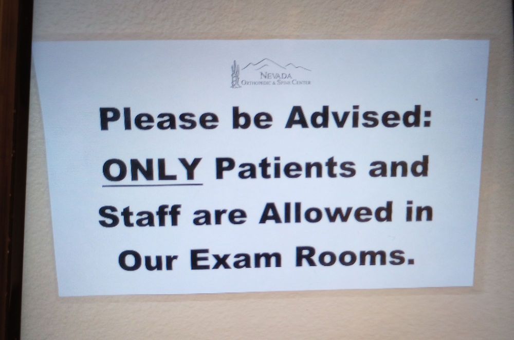 Nevada Orthopedic and Spine, sign posted in their waiting area Nevada Orthopedic and Spine, sign posted in their waiting area