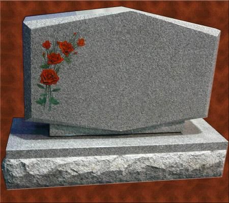 A gravestone with red roses painted on it