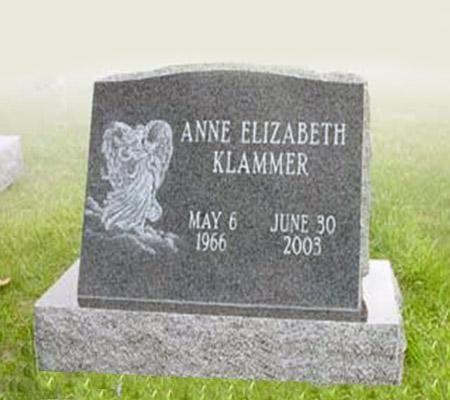 A gravestone for anne elizabeth klapper is in a cemetery.