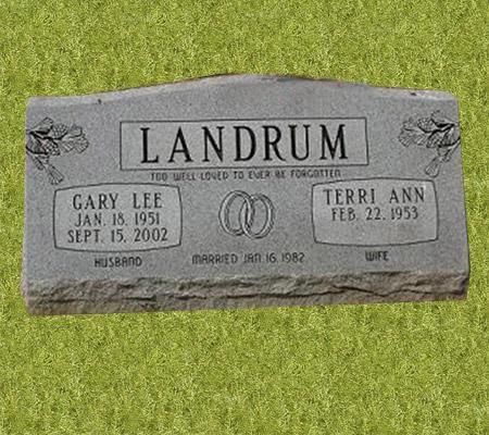 A gravestone with the name landrum on it