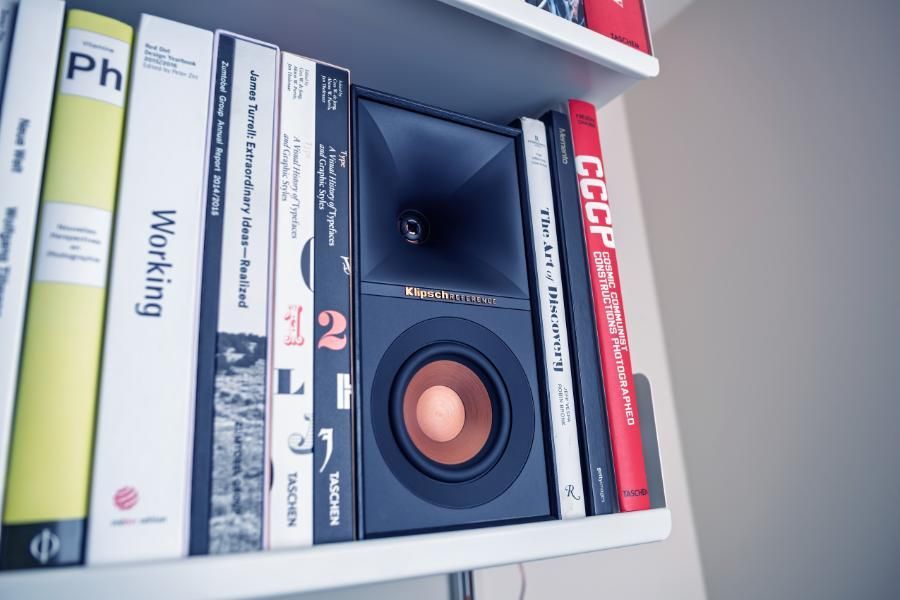 A shelf full of books including one titled working