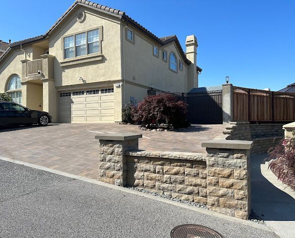 A large house with a car parked in front of it