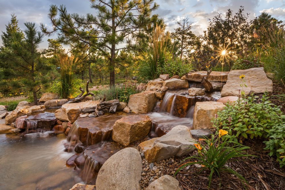 There is a fire pit in the middle of the patio.