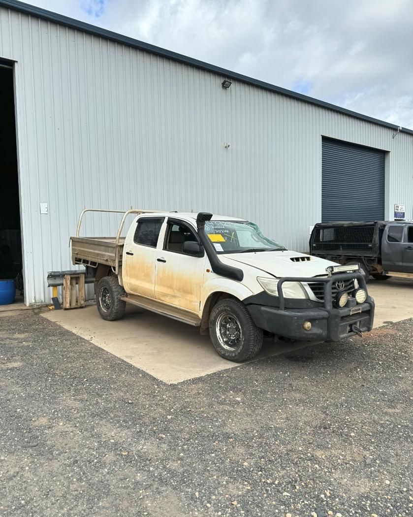 A White Truck Is Parked In Front Of A Building — TJM Dubbo In Gilgandra, NSW
