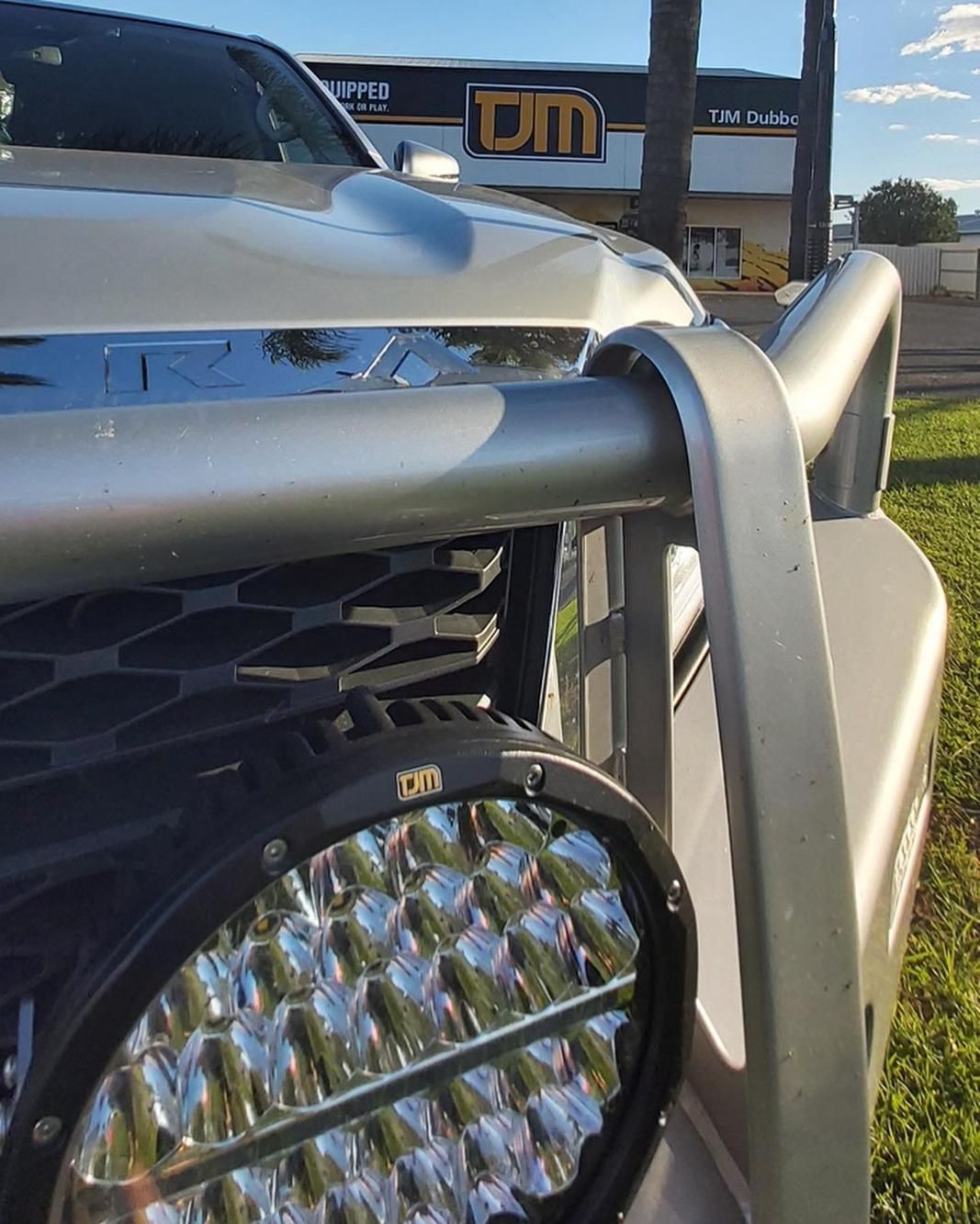 A Car Is Parked In Front Of A TJM Store — TJM Dubbo In Dubbo, NSW